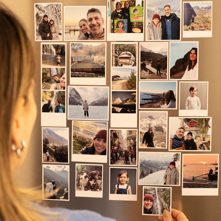 Personalised Polaroid-style photo magnets displayed in a lifestyle setting
