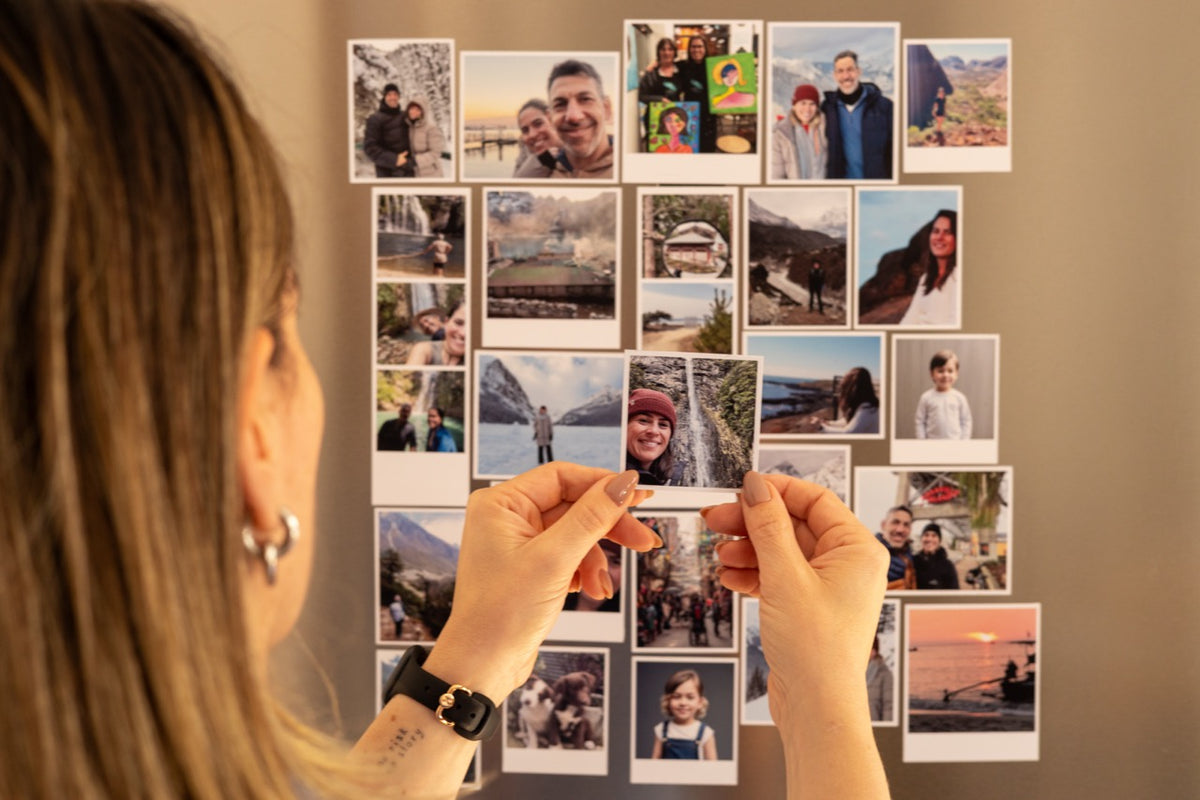 Personalised square photo magnets displayed in a lifestyle setting
